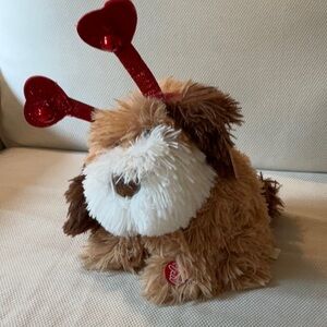 Animated puppy sings “you are the one that I want”